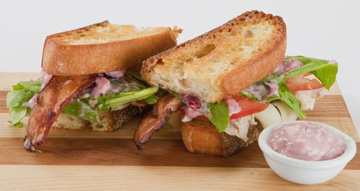 B.L.T.T.C SANDWICH   (BACON, LETTUCE, TOMATO, TURKEY, CRANBERRIES)